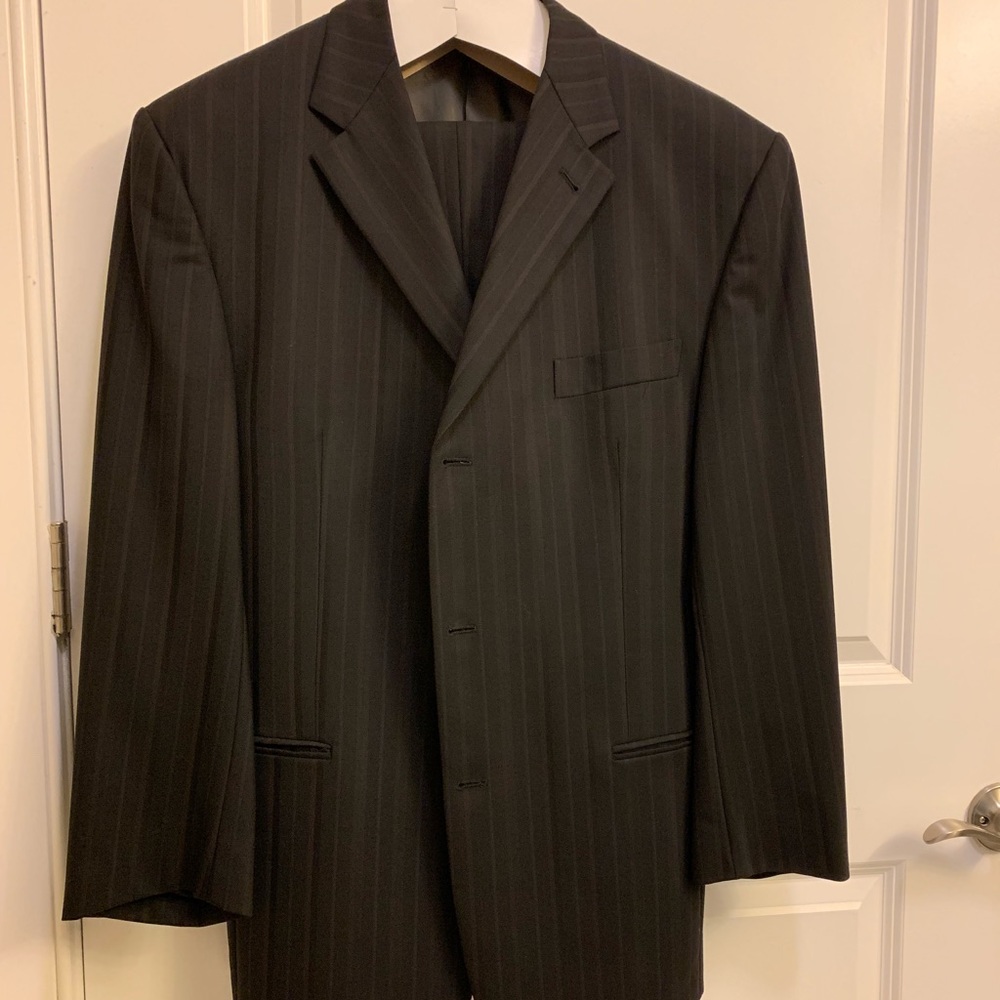 Black on black pin stripped suit